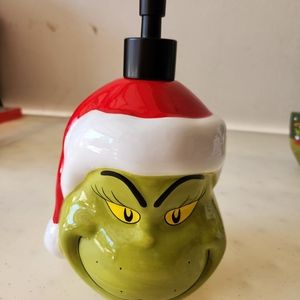 Large Grinch handwash/sanitizer/lotion dispenser.